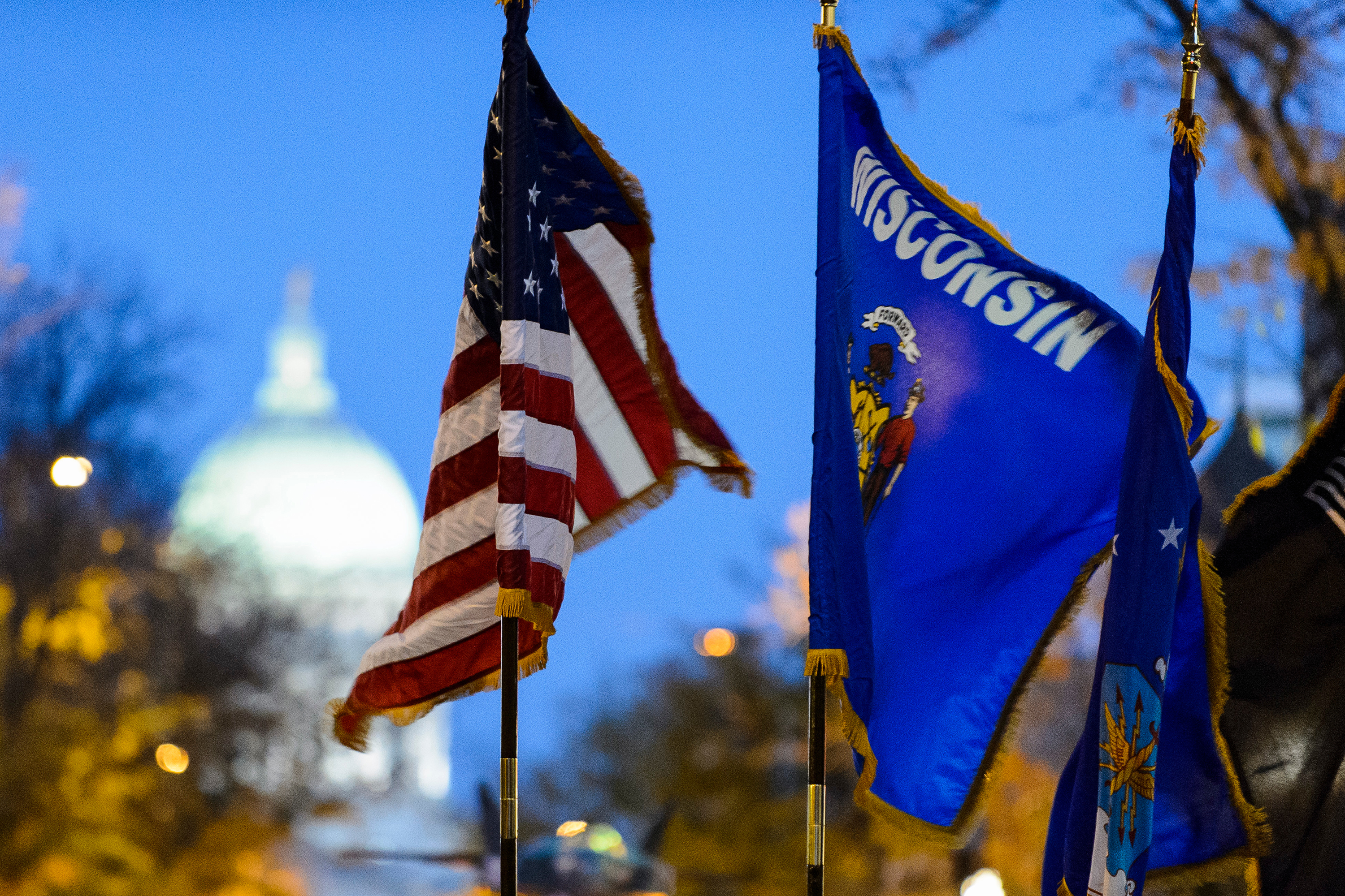 Wisconsin and US flags in front of Capitol