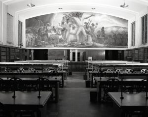 A black and white photo of "The Freeing of the Slaves" mural by John Steuart Curry in the Law Library's Quarles & Brady Reading Room.